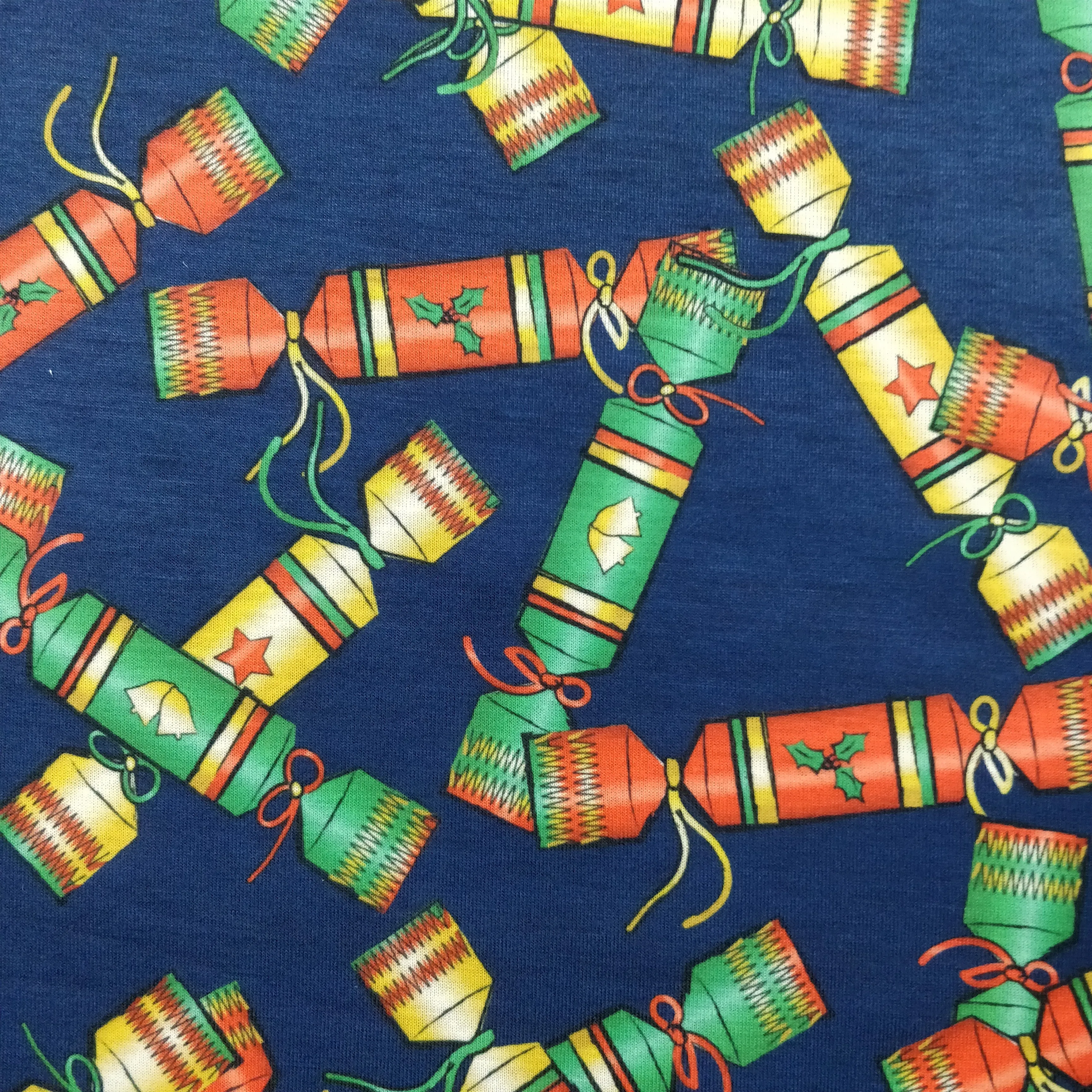 FS157 Christmas Crackers Spun Polyester Knit Stretch Fabric Navy